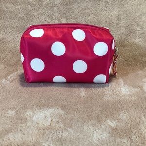 Pink with white polka dot cosmetic pouch